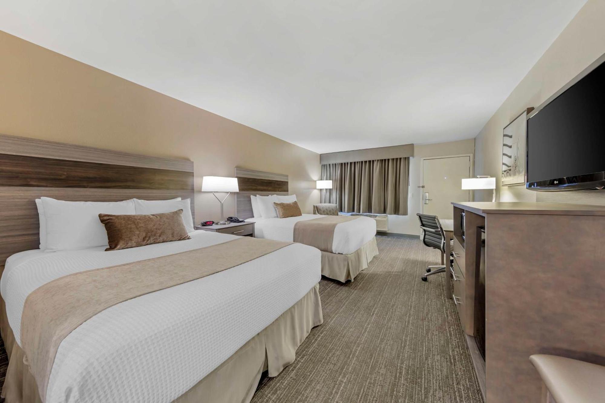 Best Western Plus Executive Inn Роленд-Хайтс Экстерьер фото
